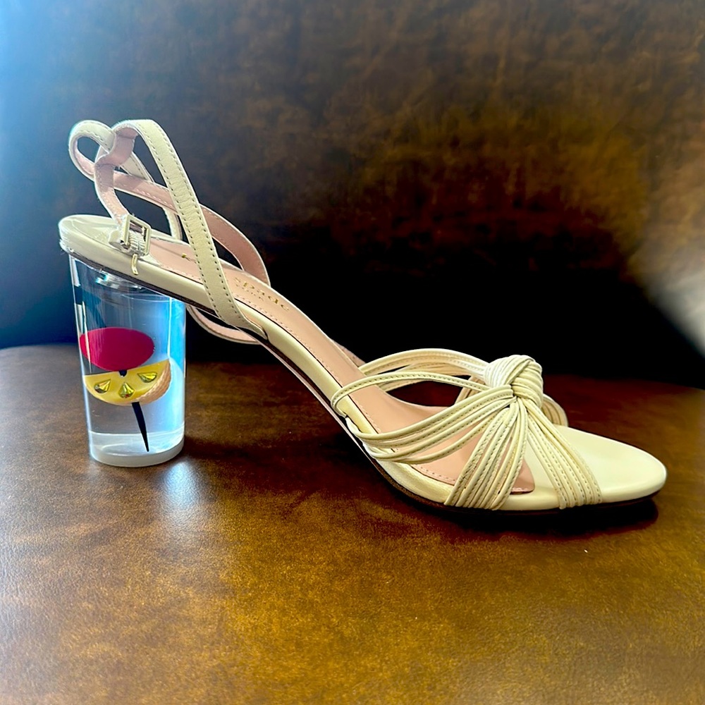Kate Spade heels, white with a “cocktail” heel, size 10